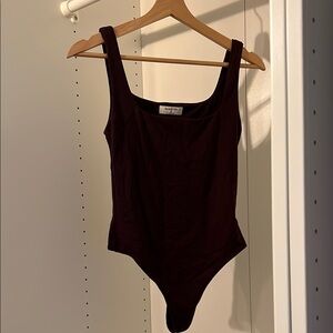 One Piece in Dark Purple Aritzia